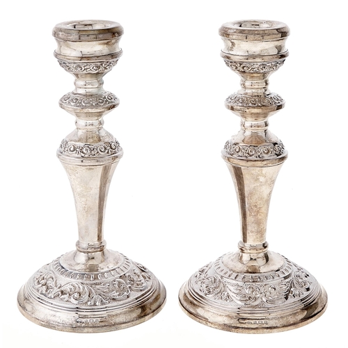 Appraisal: A pair of Elizabeth II silver candlesticks cm h by