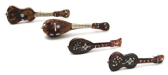 Appraisal: Tortoise Shell and Ivory Guitar and Mandolin together with mother-of-pearl