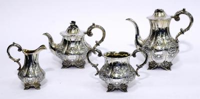 Appraisal: A VICTORIAN FOUR PIECE TEA SET of lobed baluster form