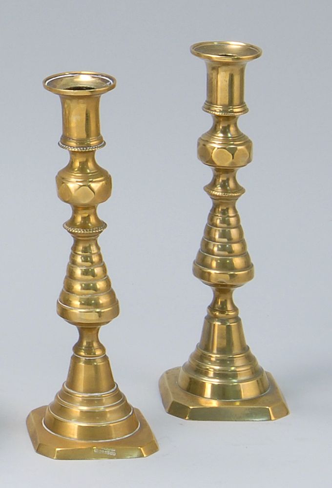 Appraisal: PAIR OF BRASS BEEHIVE PUSH-UP CANDLESTICKS th CenturyHeight Property of