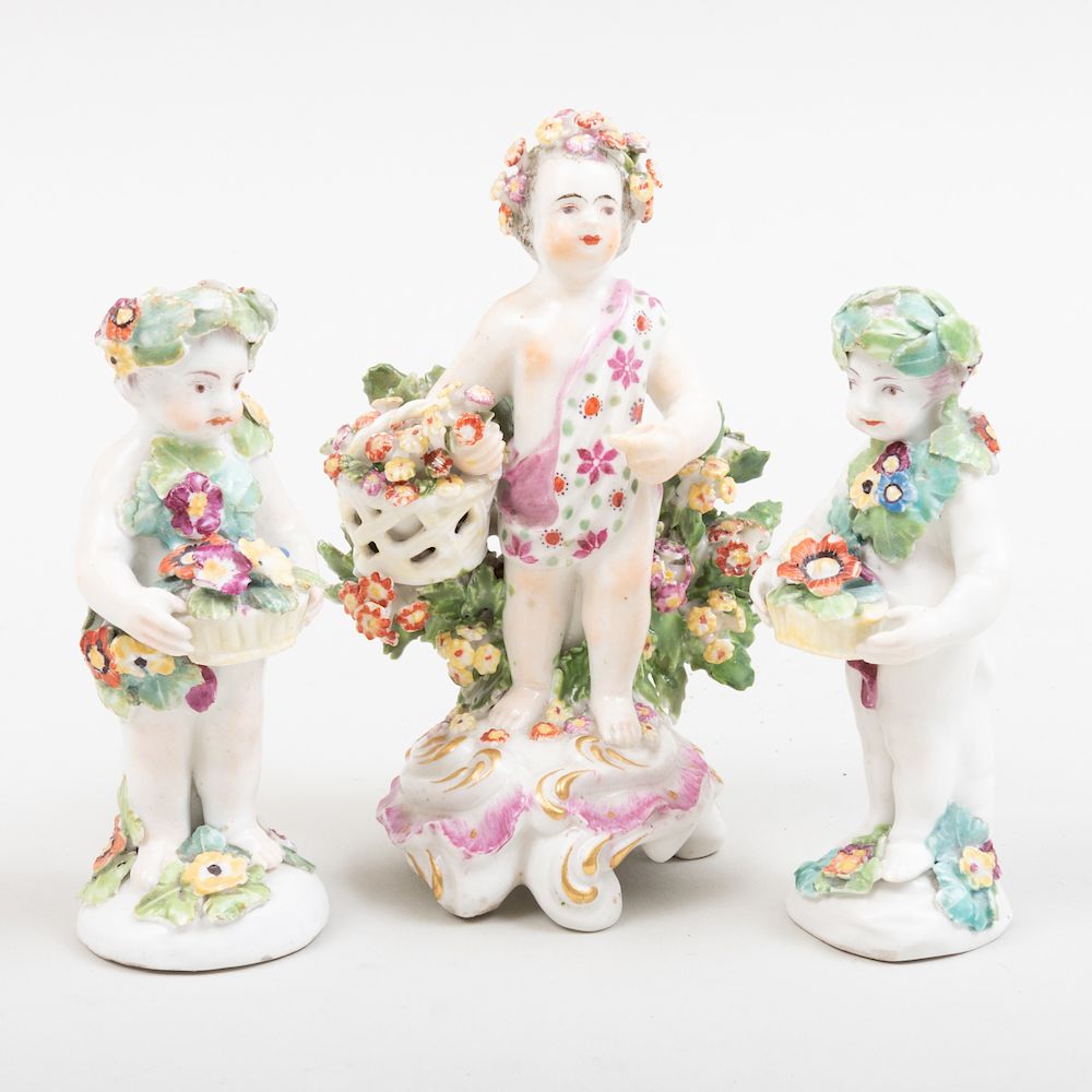 Appraisal: Derby Porcelain Putti with Flowers and a Pair of Porcelain