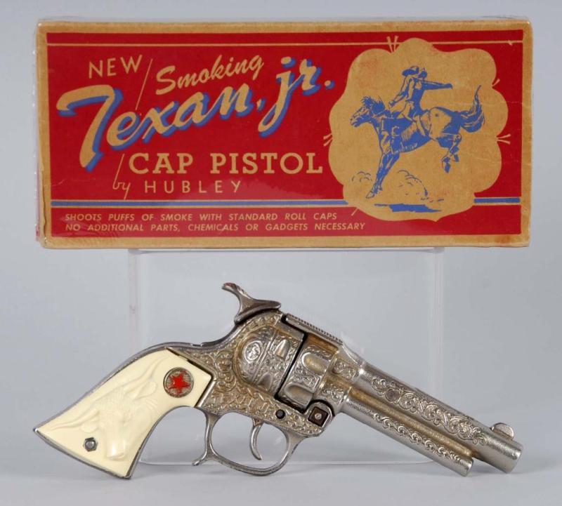 Appraisal: Cast Iron Hubley Texan Jr Cap Gun Description Dark inside