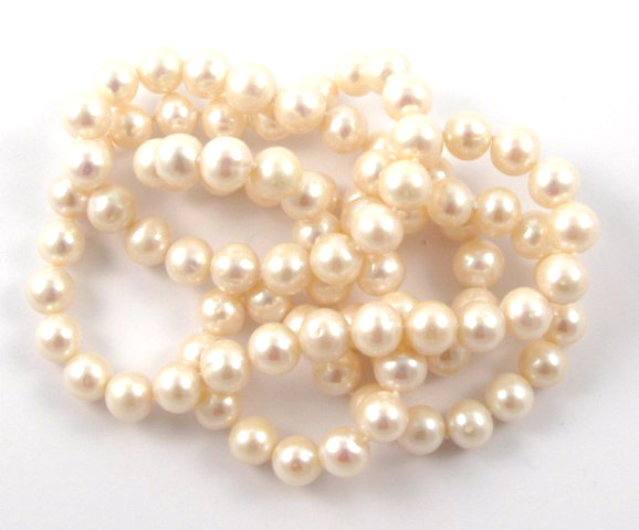 Appraisal: OPERA LENGTH PEARL NECKLACE in length and strung with well