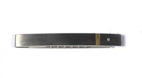 Appraisal: TIE CLIP Palladium yellow gold and steel Casual-elegant tie clip