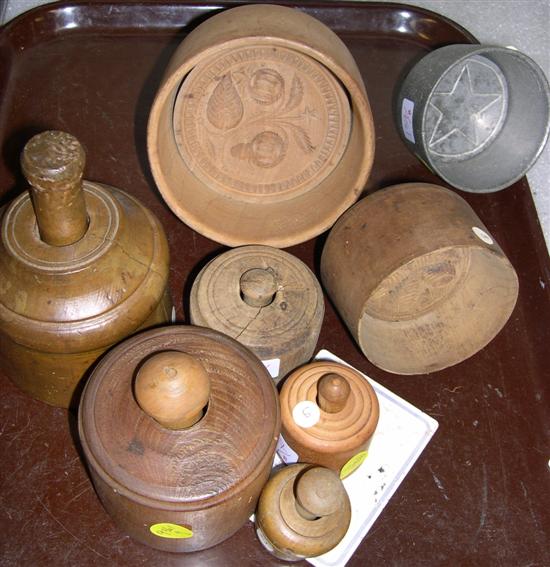 Appraisal: Seven round wooden cup type mold butter presses and one