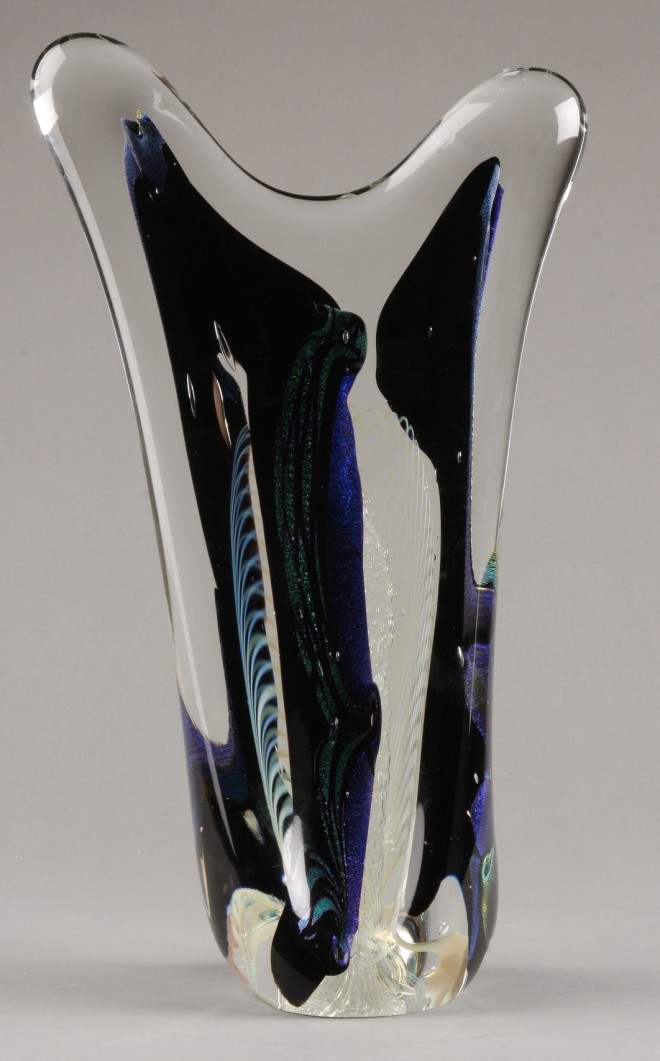 Appraisal: Art glass sculpture features clear outer portion with colorful iridescent