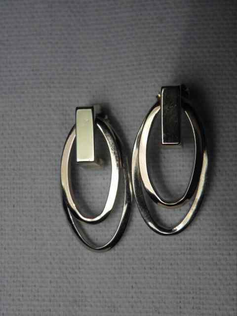 Appraisal: A pair of oval-shaped earrings in tri-color kt gold Each