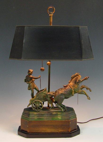 Appraisal: DECORATIVE FIGURAL CHARIOT LAMP Bronzed metal figure of chariot on