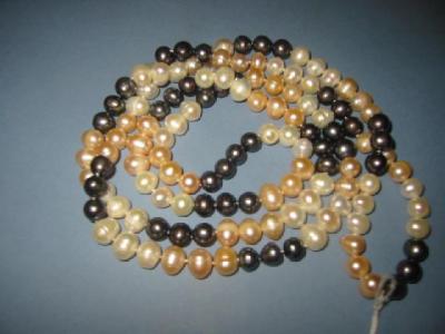 Appraisal: A CULTURED PEARL NECKLACE comprising white pink and black pearls