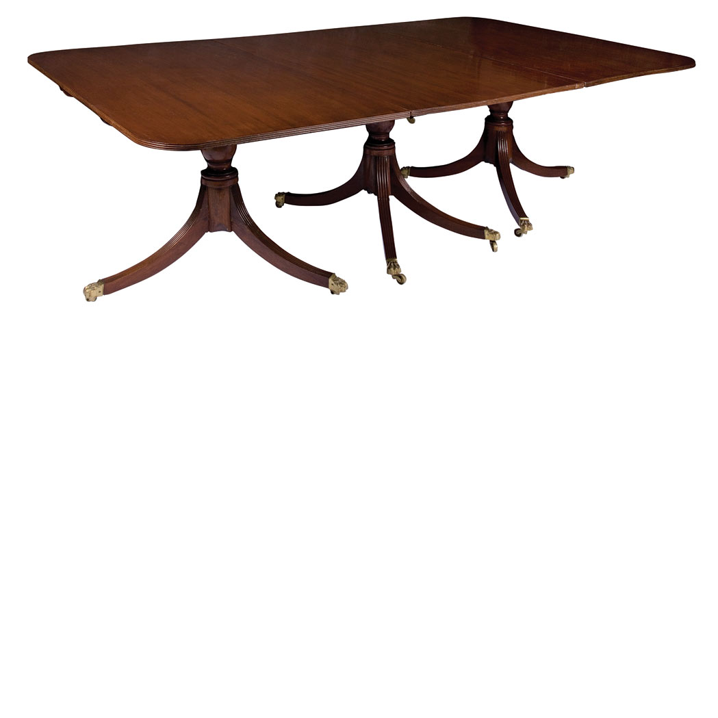 Appraisal: George III Mahogany Triple Pedestal Dining Table The rectangular top