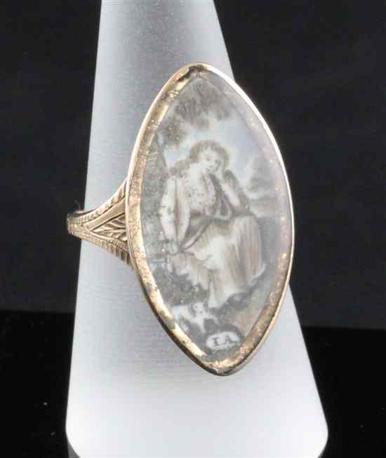 Appraisal: A George III gold navette shaped memorial ring with inset