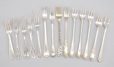 Appraisal: A Collection of Fourteen Sterling Silver Lemon Forks Of various