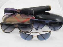 Appraisal: Four pairs of sunglasses comprising Gucci Armani Burberry and Fendi