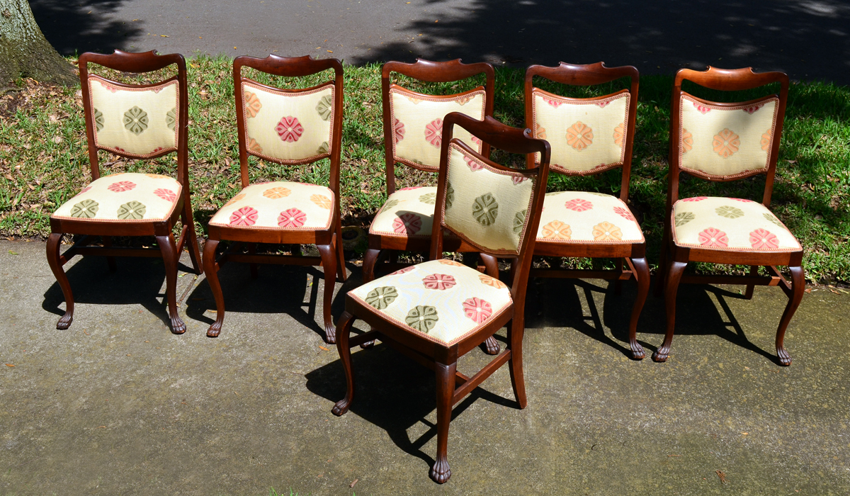 Appraisal: DINING ROOM CHAIRS Shaped top rail with applied scroll decoration