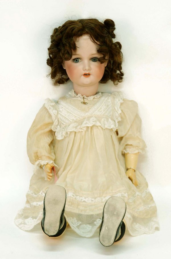 Appraisal: An Armand Marseille child doll Bisque socket head Fully jointed