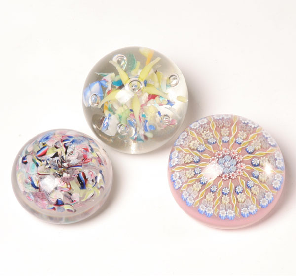 Appraisal: Three glass paperweights one Scottish Perthshire millefiori weight with paper