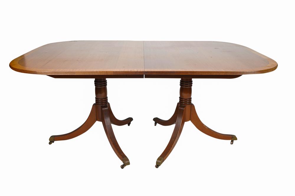 Appraisal: GEORGE III STYLE SATINWOOD-BANDED MAHOGANY DOUBLE PEDESTAL DINING TABLEwith four