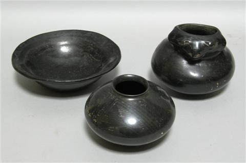 Appraisal: THREE NATIVE AMERICAN BLACK POTTERY WARES The group including a