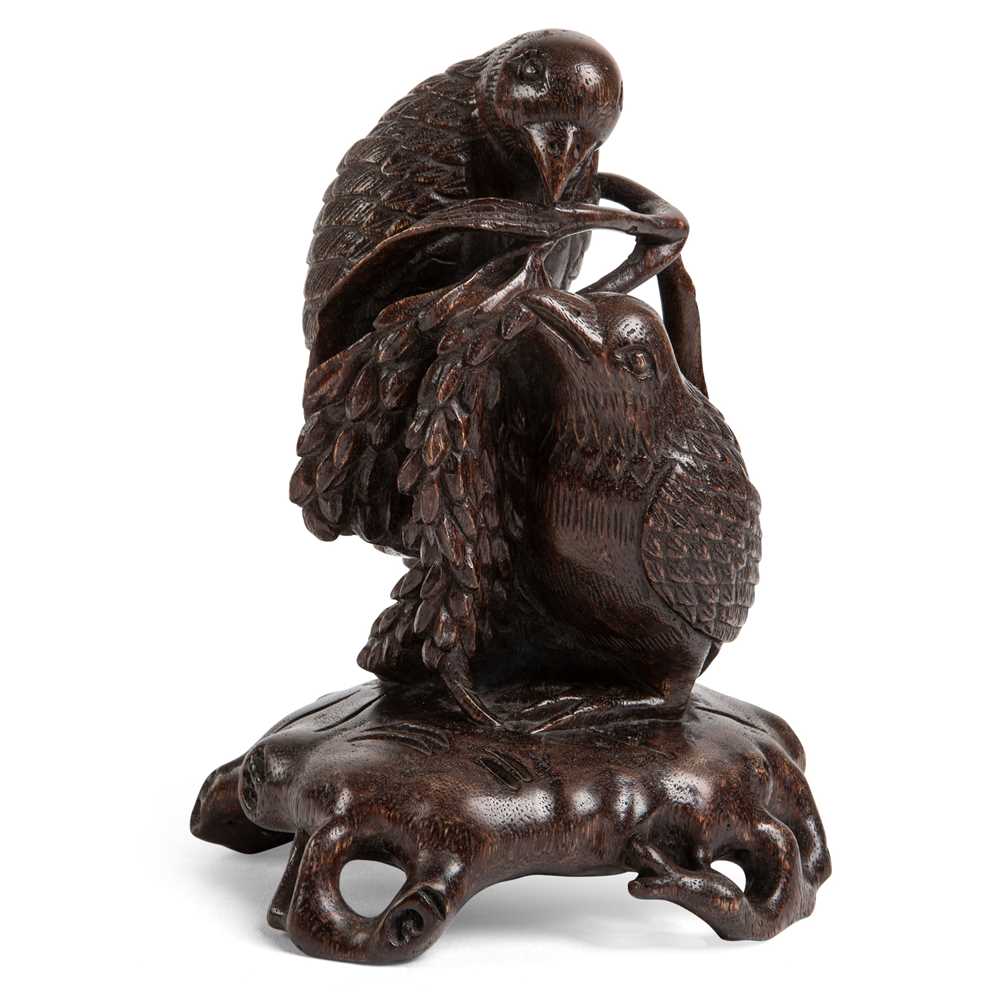 Appraisal: AGARWOOD CARVING OF TWO BIRDS carved in round from a