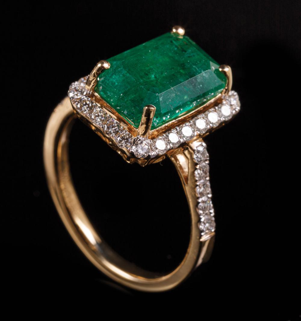 Appraisal: kt Yellow Gold Emerald and Diamond Ring center rectangular cornered