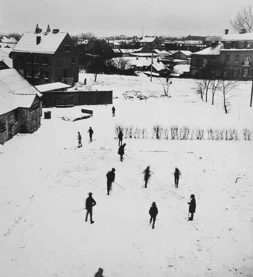 Appraisal: Antanas Sutkus b Ice Hockey in Evening Vilnius Gelatin silver