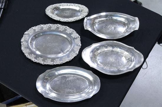 Appraisal: FIVE STERLING SILVER DISHES A small repousse decorated tray ''