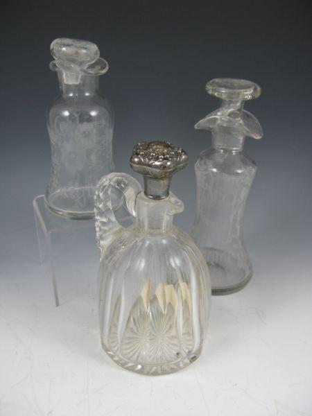 Appraisal: Three Oil Vinegar Glass Cruets the first two with hand-engraved