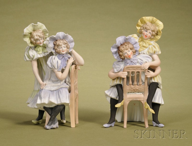 Appraisal: Two German Painted Bisque Porcelain Naughty and Nice Figural Groups