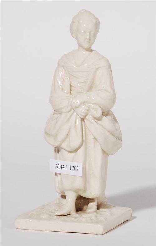 Appraisal: FIGURE OF A GIRL Eastern France circa White figure H