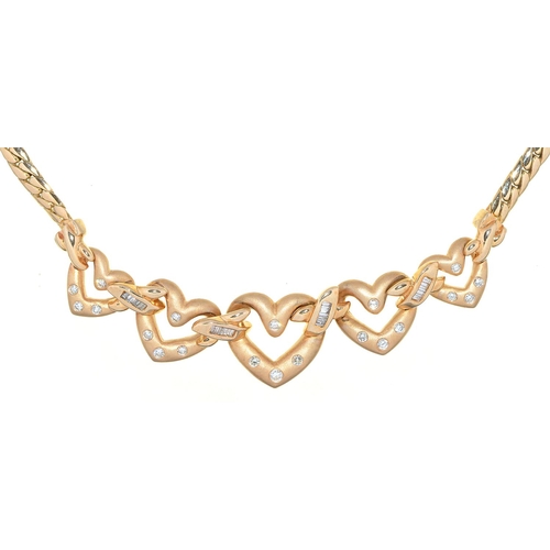 Appraisal: A diamond linked hearts necklace in gold cm l marked