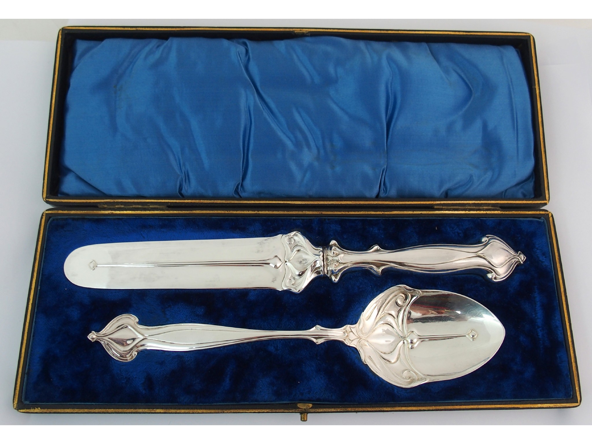 Appraisal: A pair of Art Nouveau silver plated cake serversprobably by