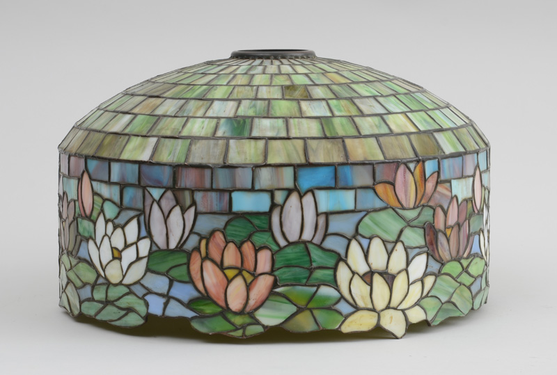 Appraisal: AMERICAN ART NOUVEAU LEADED GLASS SHADE Of domical-form with irregular