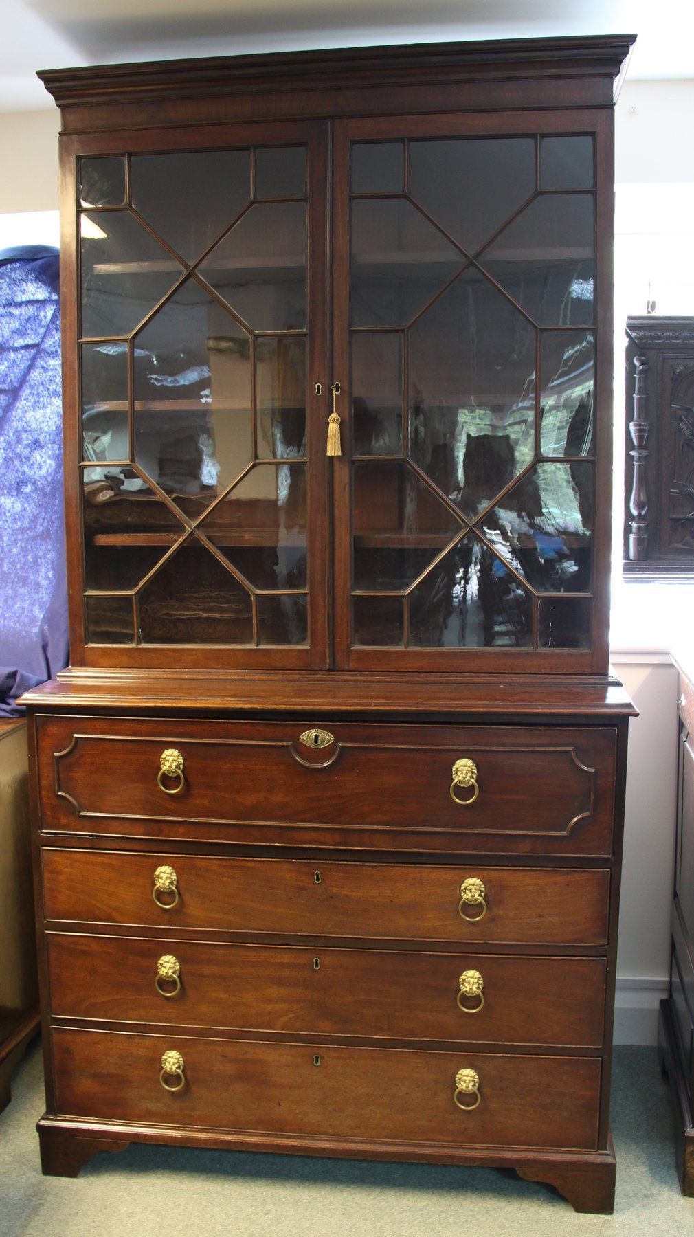 Appraisal: A George III mahogany secretaire bookcase with astragal glazed doors