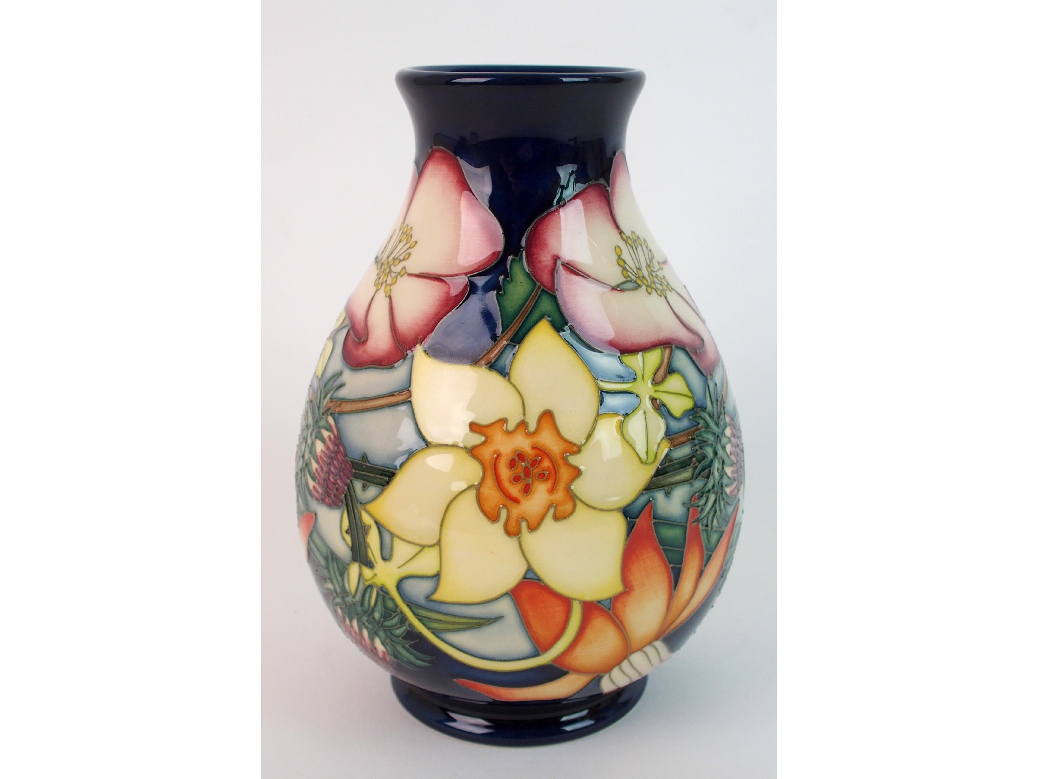 Appraisal: A Moorcroft pottery Golden Jubilee vasedecorated with tubelined roses thistles