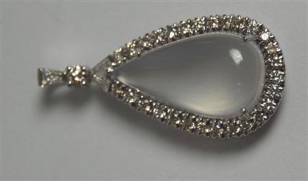 Appraisal: An ct white gold mounted moonstone and diamond set pendant