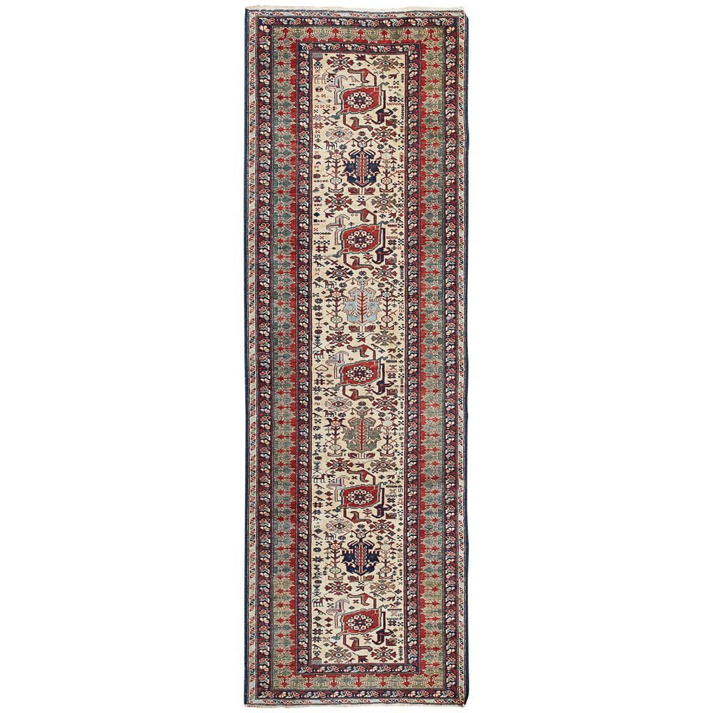 Appraisal: KUBA STYLE RUNNER MODERN the cream field with harshang medallions