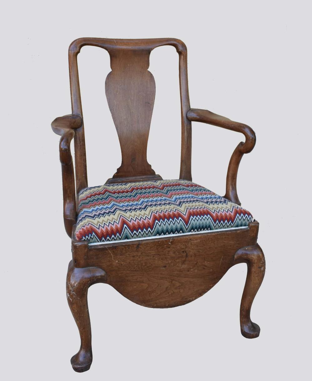 Appraisal: QUEEN ANNE STYLE WALNUT ARMCHAIR th Century The shaped crest