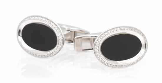 Appraisal: A Pair of Karat White Gold Onyx and Diamond Cufflinks