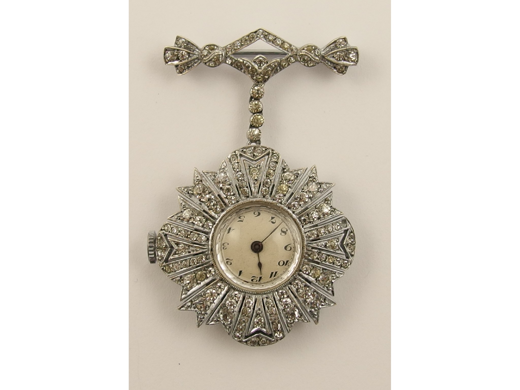 Appraisal: A costume jewellery brooch watch set with diamante with silver