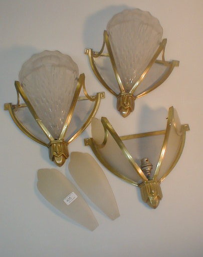 Appraisal: Three brass wall mounted Art Deco light fittings