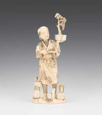 Appraisal: A Japanese Ivory Figurine of a Bonsai Trainer A Japanese