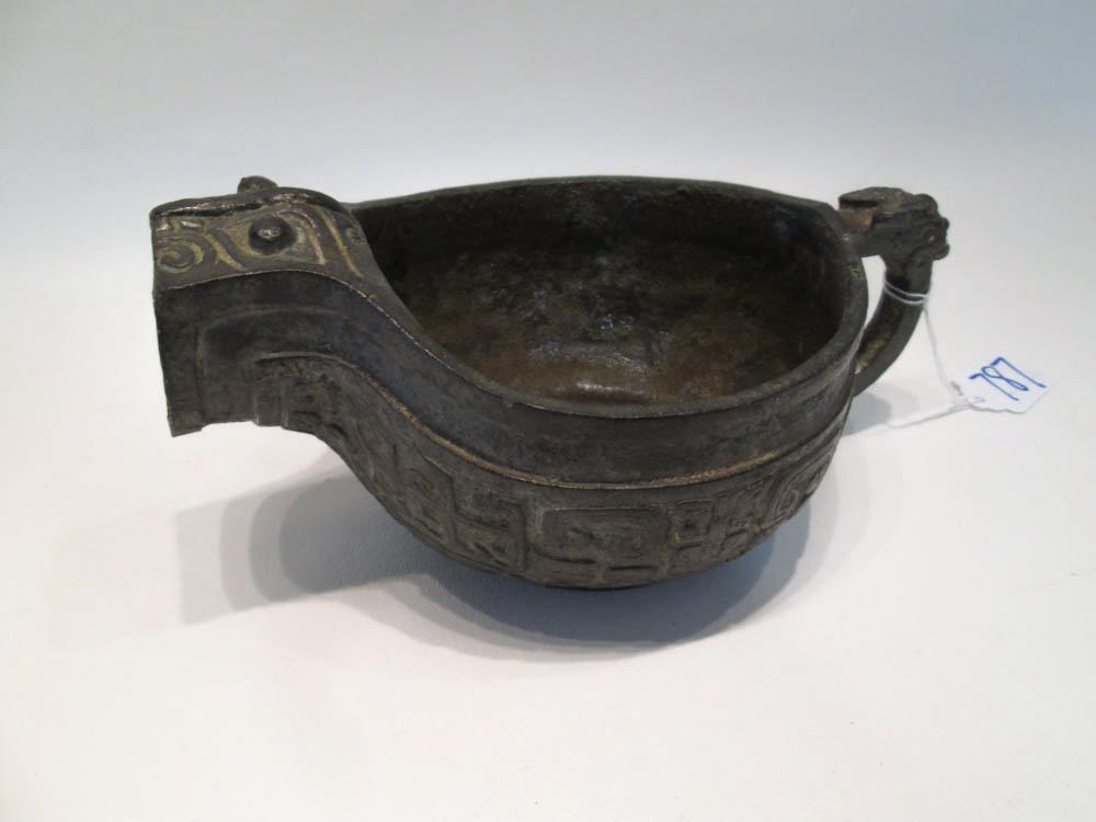 Appraisal: CHINESE BRONZE ZHOU STYLE WINE POT the patinated vessel with