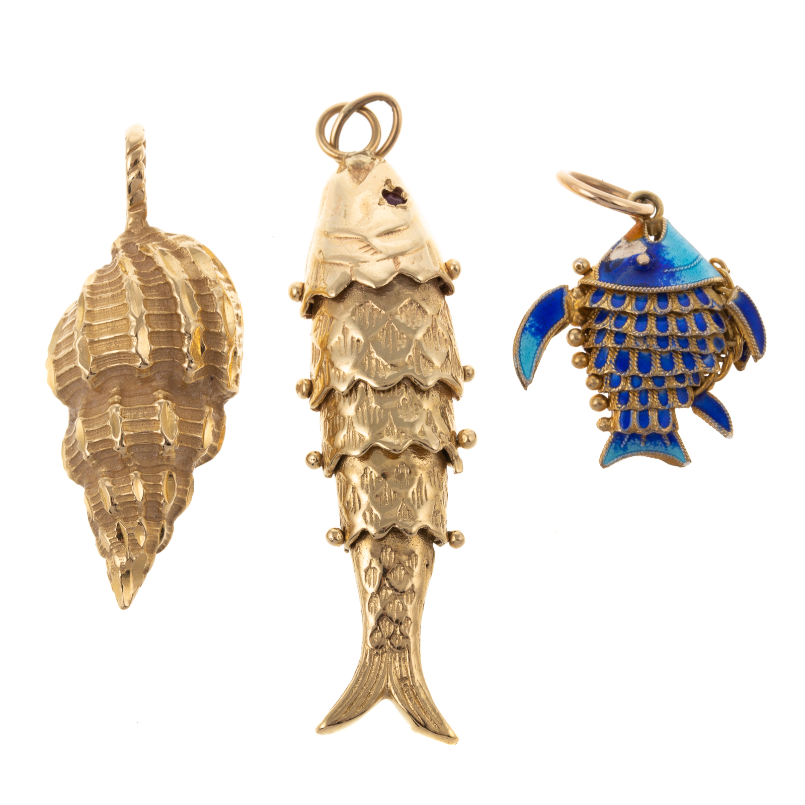 Appraisal: A COLLECTION OF SEA-THEMED PENDANTS IN GOLD K yellow gold