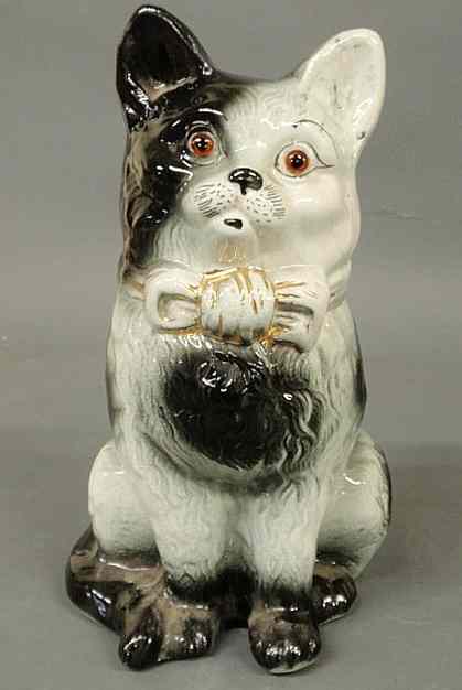 Appraisal: Large th c Staffordshire seated grey and black cat with