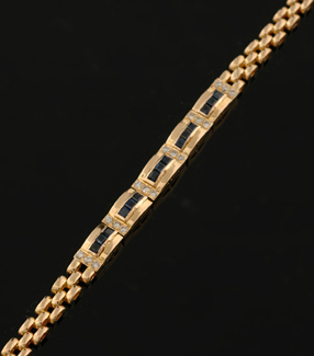 Appraisal: A sapphire and diamond cocktail bracelet Having five central domed