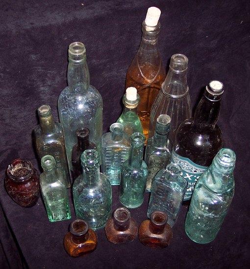 Appraisal: Three long necked oz Bovril jars and sundry glass bottles