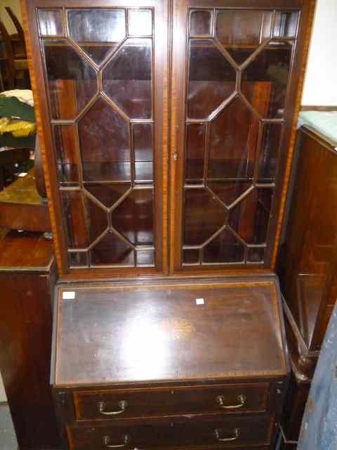 Appraisal: AN EDWARDIAN MAHOGANY AND SATINWOOD INLAID BUREAU BOOKCASE wide