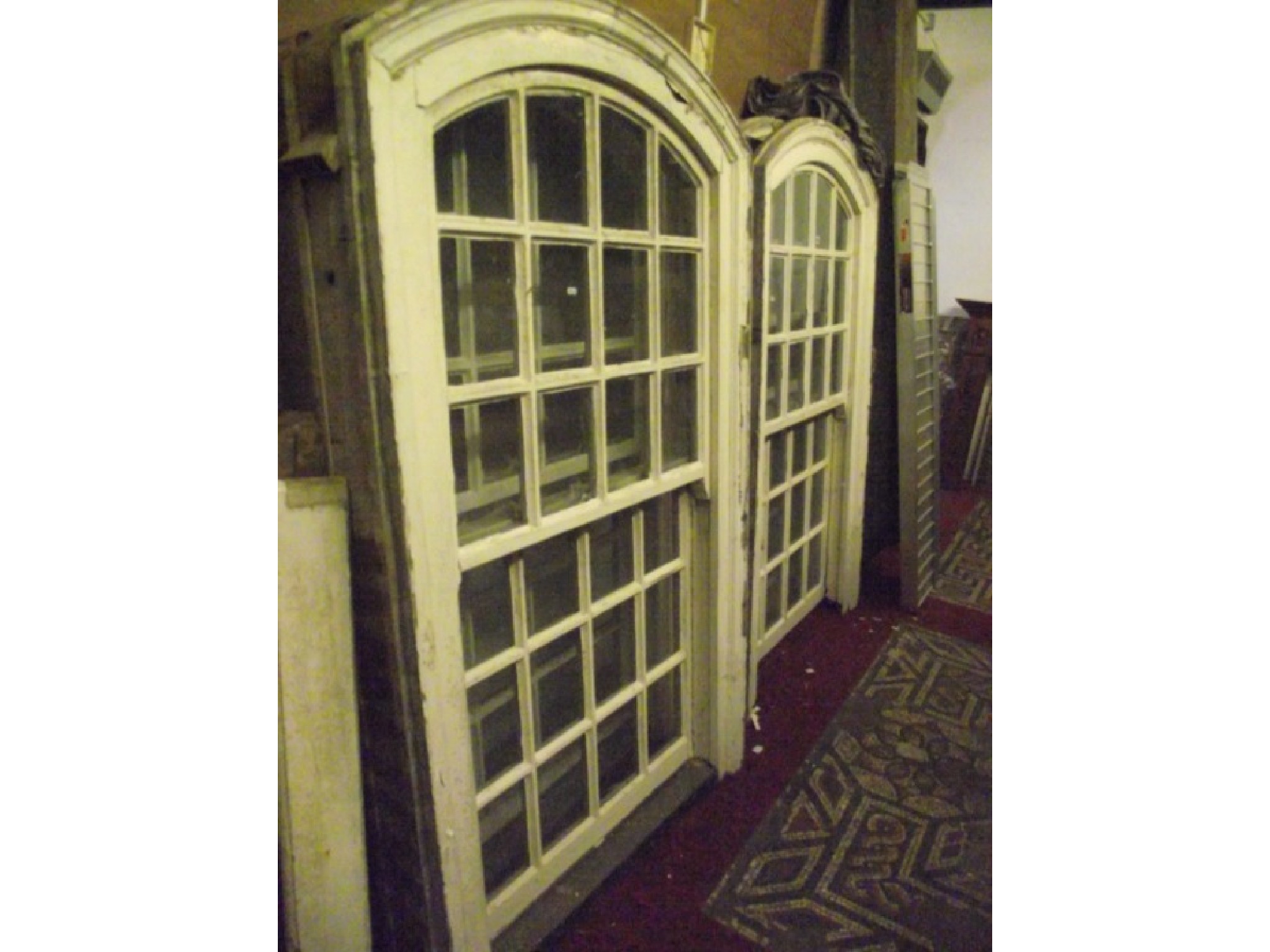 Appraisal: A set of four reclaimed Georgian sash windows of arched