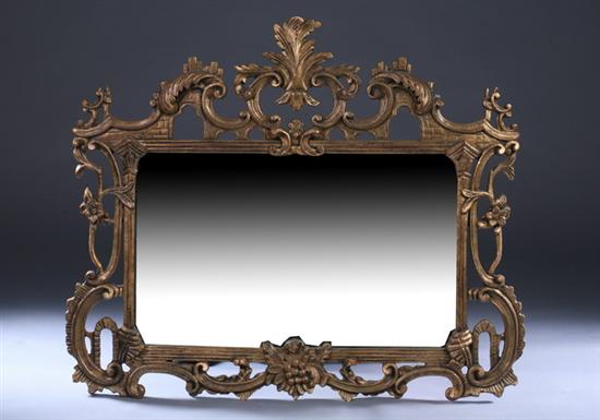 Appraisal: GEORGIAN STYLE GILTWOOD OBLONG WALL MIRROR th century Scrolling foliate