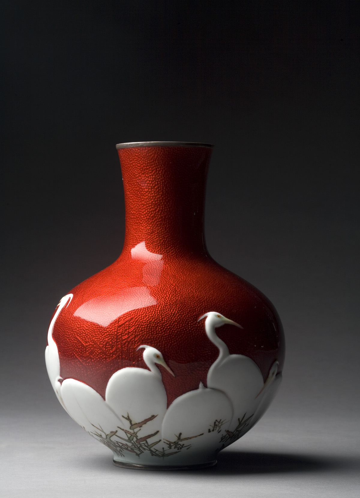 Appraisal: JAPANESE RED GINBARI ENAMEL VASE MID-TWENTIETH CENTURY Surrounded at the